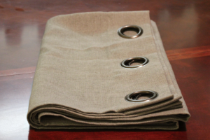 Looking to change up your headboard? Take a look at this awesome DIY Upholstered Headboard with Nailhead Trim! UpcycledTreasures.com