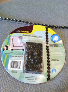 Looking to change up your headboard? Take a look at this awesome DIY Upholstered Headboard with Nailhead Trim! UpcycledTreasures.com