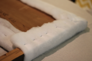 Looking to change up your headboard? Take a look at this awesome DIY Upholstered Headboard with Nailhead Trim! UpcycledTreasures.com