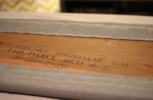 Looking to change up your headboard? Take a look at this awesome DIY Upholstered Headboard with Nailhead Trim! UpcycledTreasures.com