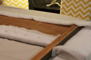 Looking to change up your headboard? Take a look at this awesome DIY Upholstered Headboard with Nailhead Trim! UpcycledTreasures.com