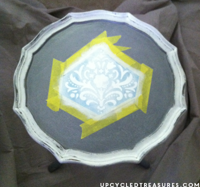 Have plant stands that aren't in the best shape? Check out these detailed updated DIY stenciled plant stands! UpcycledTreasures.com