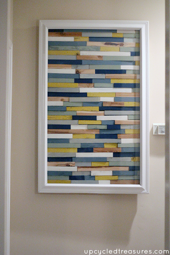 Love this idea! Paint wood shims different colors and then glue them down to create an interesting piece of wood shim artwork! upcycledtreasures.com