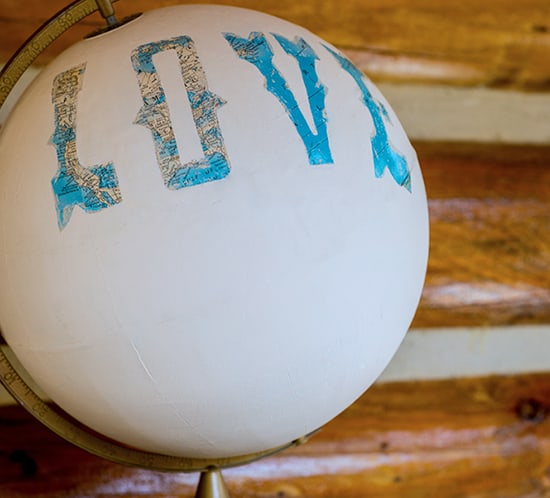 diy painted globe for wedding guestbook table decor mountainmodernlife.com