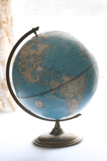 Looking for an outside the box idea? Look no further, check out this DIY Painted Globe for home or wedding decor. MountainModernLife.com