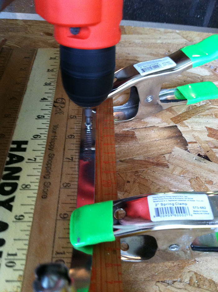 Looking for a creative storage solution? Check out how to create a mason jar wall storage using vintage yardsticks! UpcycledTreasures.com