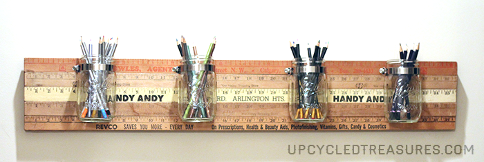 Looking for a creative storage solution? Check out how to create a mason jar wall storage using vintage yardsticks! UpcycledTreasures.com