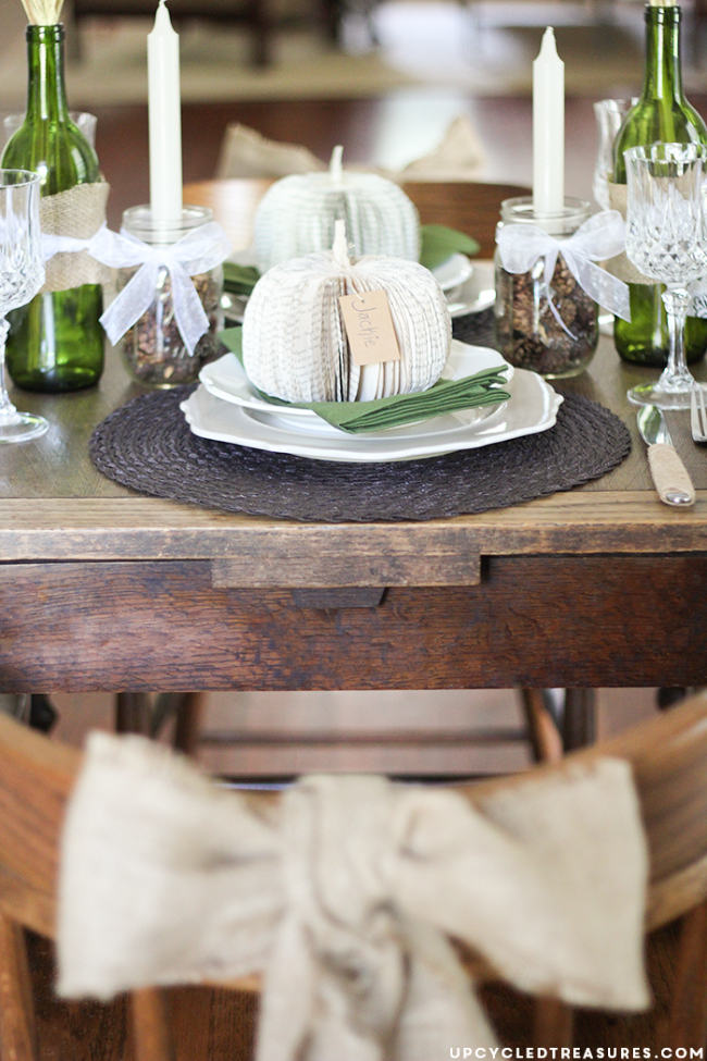 How to make DIY paper book pumpkins for a creative table place setting or to use as Halloween or Thanksgiving decor.