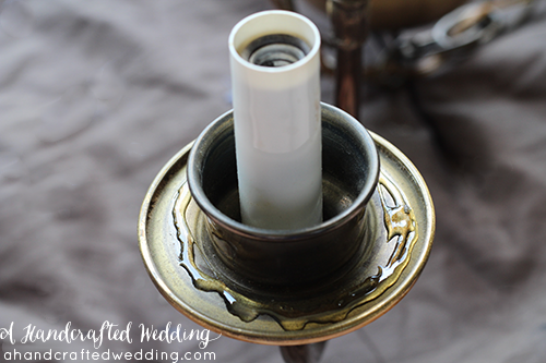 Have an old chandelier just sitting around? Well, turn that thrift shop chandelier into a DIY Mason Jar Chandelier! MountainModernLife.com