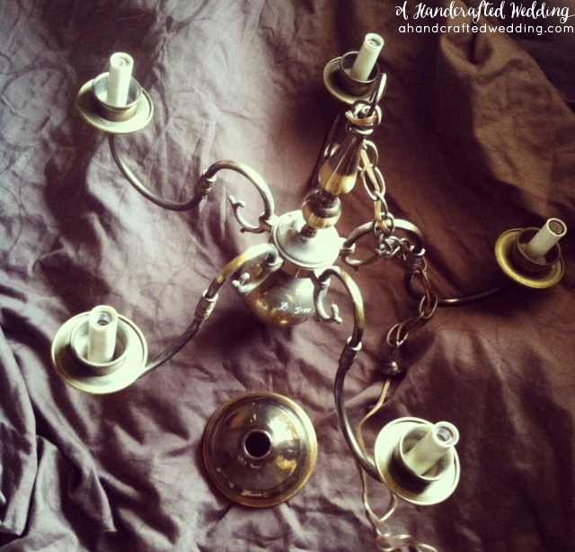 Have an old chandelier just sitting around? Well, turn that thrift shop chandelier into a DIY Mason Jar Chandelier! MountainModernLife.com