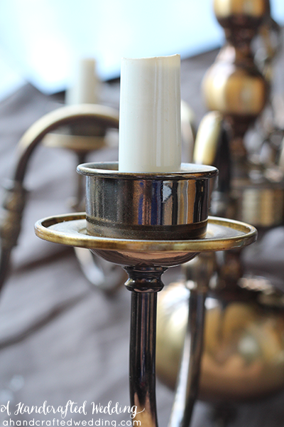 Have an old chandelier just sitting around? Well, turn that thrift shop chandelier into a DIY Mason Jar Chandelier! MountainModernLife.com