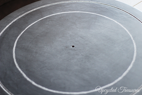 How to Upcycle a Table into a Clock! See how to transform an outdated thrift shop table into something new for a gallery wall! UpcycledTreasures.com