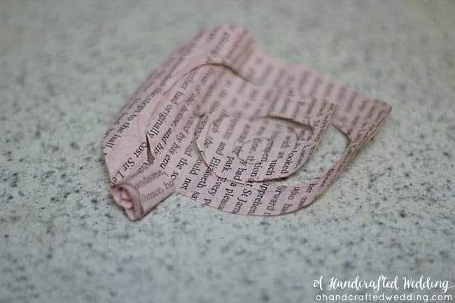 How to make Book Page Flowers for Boutonnieres. Create flowers for using dyed book pages for a vintage inspired wedding. MountainModernLife.com