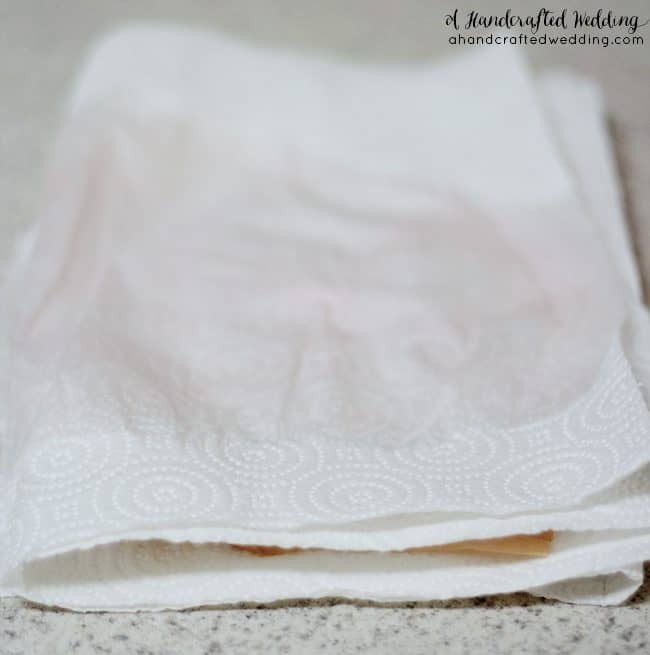 How to make Book Page Flowers for Boutonnieres. Create flowers for using dyed book pages for a vintage inspired wedding. MountainModernLife.com