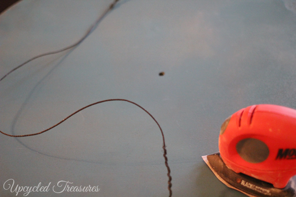 How to Upcycle a Table into a Clock! See how to transform an outdated thrift shop table into something new for a gallery wall! UpcycledTreasures.com