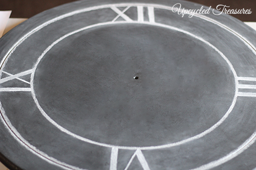 How to Upcycle a Table into a Clock! See how to transform an outdated thrift shop table into something new for a gallery wall! UpcycledTreasures.com