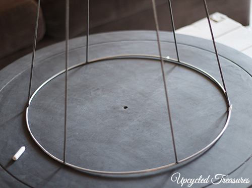 How to Upcycle a Table into a Clock! See how to transform an outdated thrift shop table into something new for a gallery wall! UpcycledTreasures.com