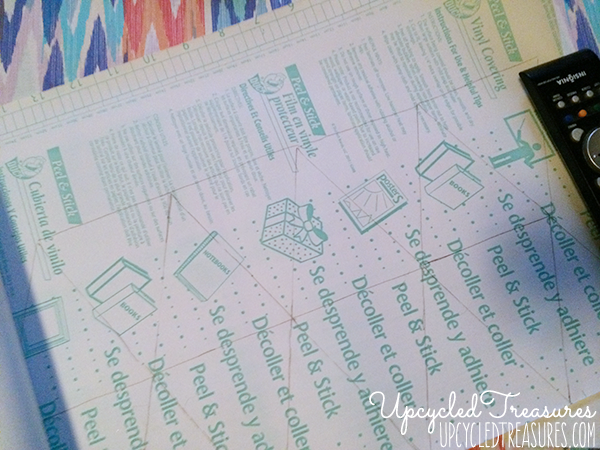 Looking to spruce up your walls in a rental property? Check out how to create a temporary DIY triangle accent wall for Less than $3! UpcycledTreasures.com