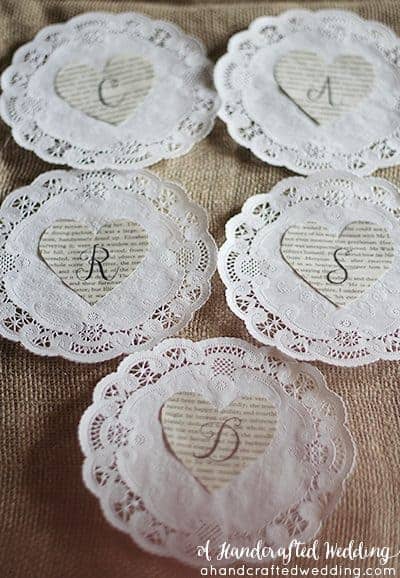 DIY Vintage Inspired Wedding Cards Banner. How to create a book page banner out of paper doilies and book pages. MountainModernLife.com