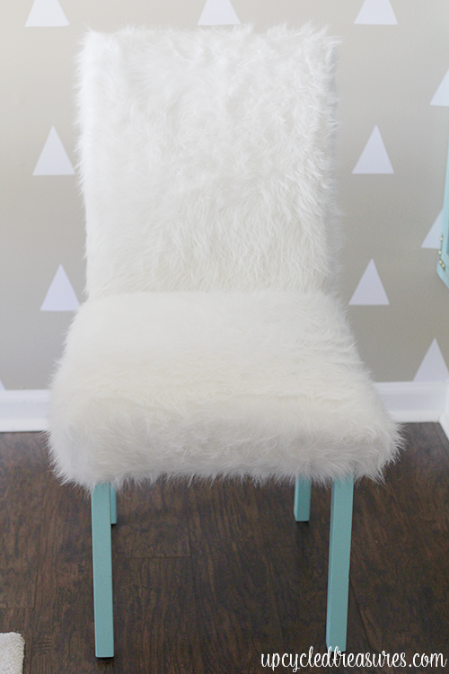 Whimsical Faux Fur Office Chair Makeover. A boring chair gets transformed using faux fur and pops of turquoise! UpcycledTreasures.com