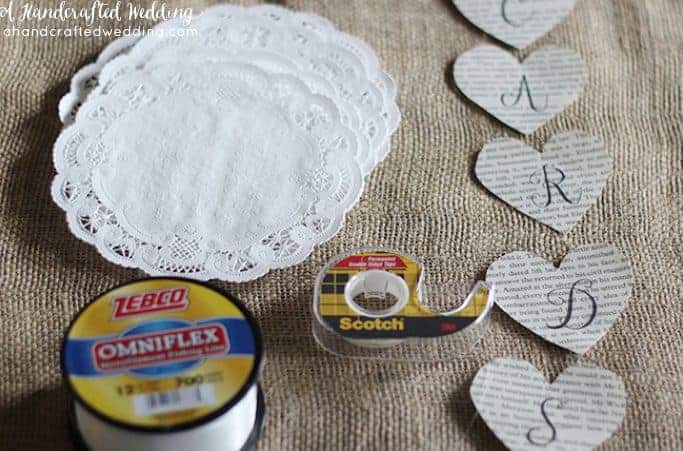 DIY Vintage Inspired Wedding Cards Banner. How to create a book page banner out of paper doilies and book pages. MountainModernLife.com