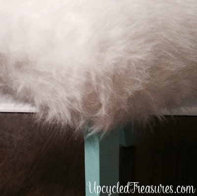 Whimsical Faux Fur Office Chair Makeover. A boring chair gets transformed using faux fur and pops of turquoise! UpcycledTreasures.com