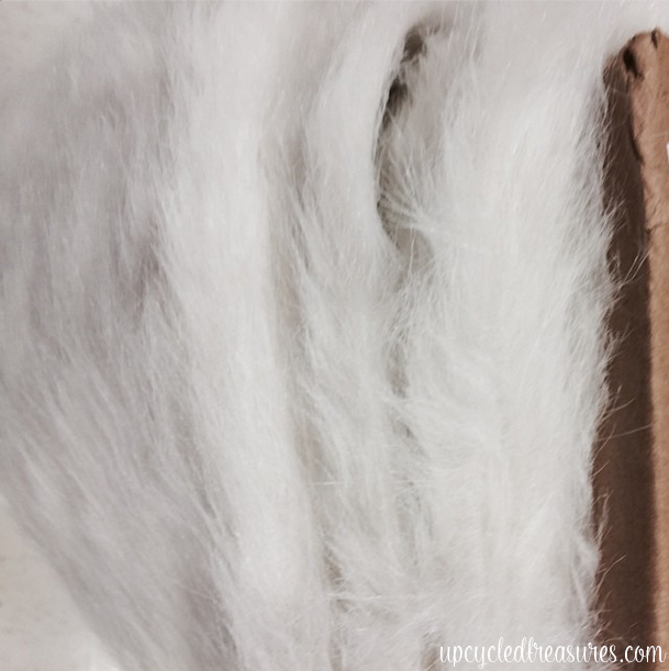 Whimsical Faux Fur Office Chair Makeover. A boring chair gets transformed using faux fur and pops of turquoise! UpcycledTreasures.com