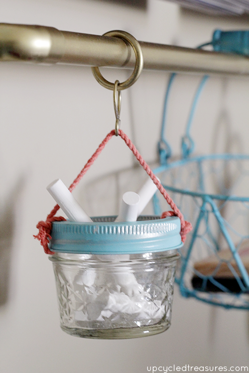 Get organized with this DIY Gold Pipe Hanging Storage which is perfect for storing items in a small space, craft room or kitchen!