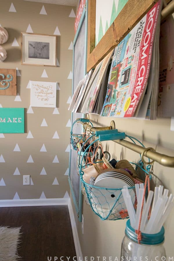 Get organized with this DIY Gold Pipe Hanging Storage which is perfect for storing items in a small space, craft room or kitchen!