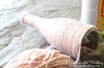 Check out how to upcycle bottles into Yarn Wrapped Bottle Vases or Table Numbers for your Wedding Reception Decor | MountainModernLife.com