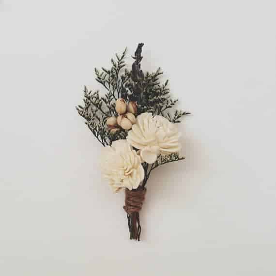 Planning a rustic, vintage, or woodland inspired wedding? Take a look at these 25 Rustic Boutonniere Ideas.