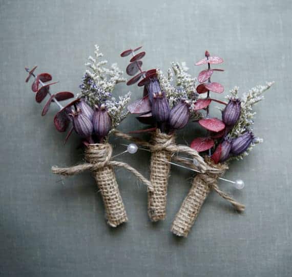 Planning a rustic, vintage, or woodland inspired wedding? Take a look at these 25 Rustic Boutonniere Ideas.