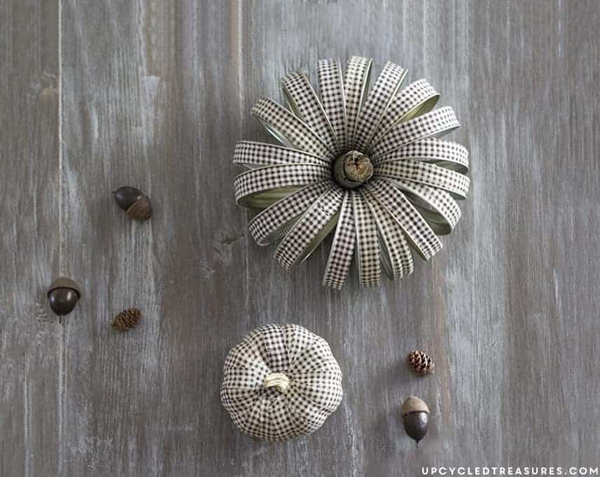 Create these adorable DIY fabric tape pumpkins by wrapping faux pumpkins with fabric tape! MountainModernLife.com