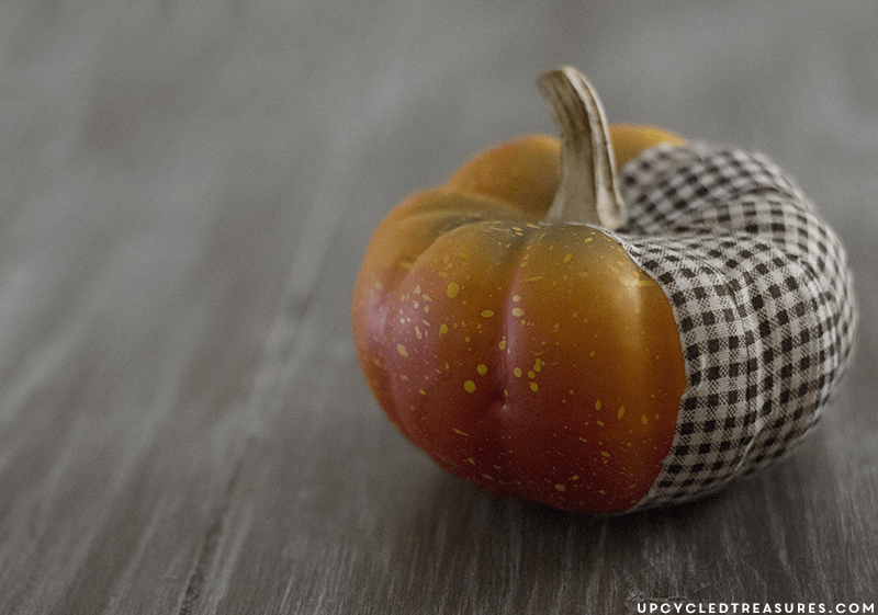 Create these adorable DIY fabric tape pumpkins by wrapping faux pumpkins with fabric tape! MountainModernLife.com