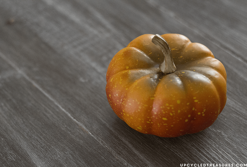 Create these adorable DIY fabric tape pumpkins by wrapping faux pumpkins with fabric tape! MountainModernLife.com