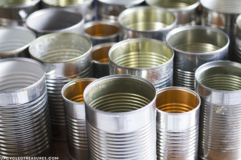 Need something cute to organize desk space, but don't have a huge budget? Check out this Upcycled Tin Can Organizer! UpcycledTreasures.com