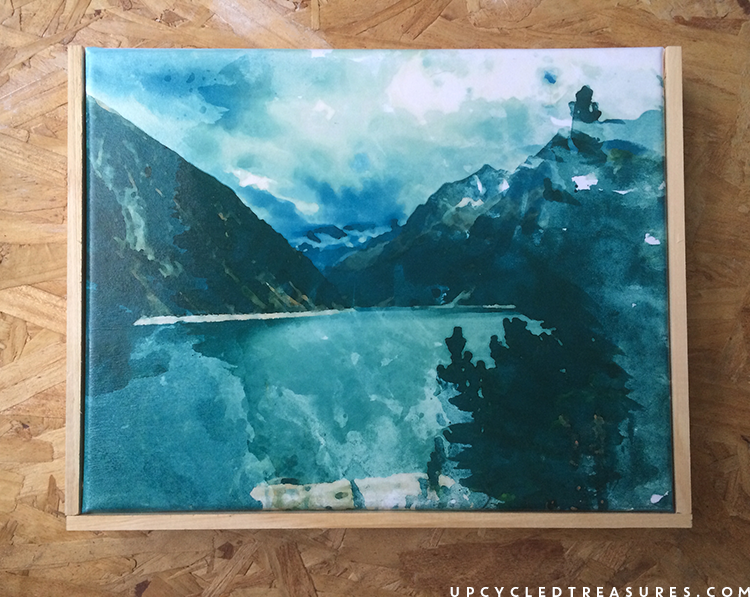 easy way to frame a small canvas using paint sticks. | MountainModernLife.com