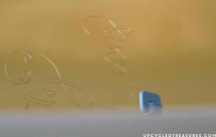 Silhouette machine in action, cutting gold foil paper. MountainModernLife.com