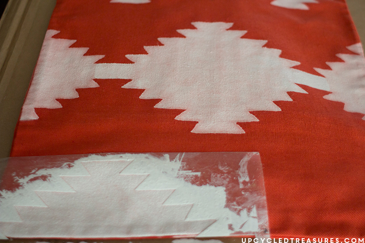 Stencil moved to continue pattern further along pillow. MountainModernLife.com