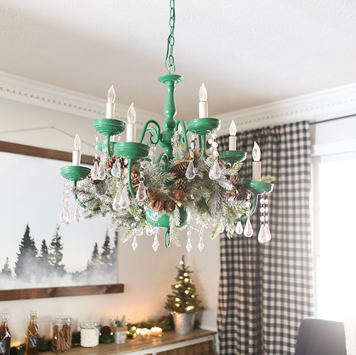 Chandelier with Christmas Greenery