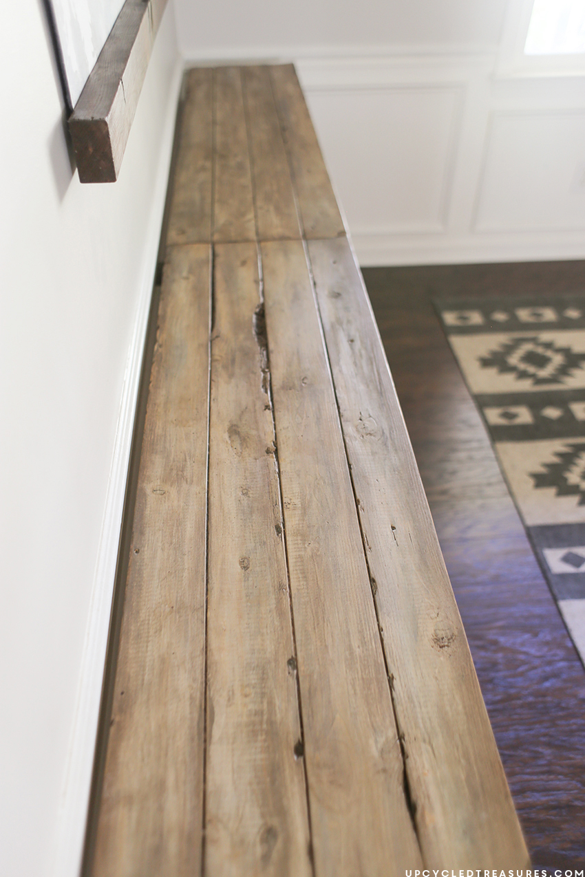 How to upcycle trash into treasure! See how a thrown out cabinet is transformed into an upcycled barnwood style sideboard. MountainModernLife.com
