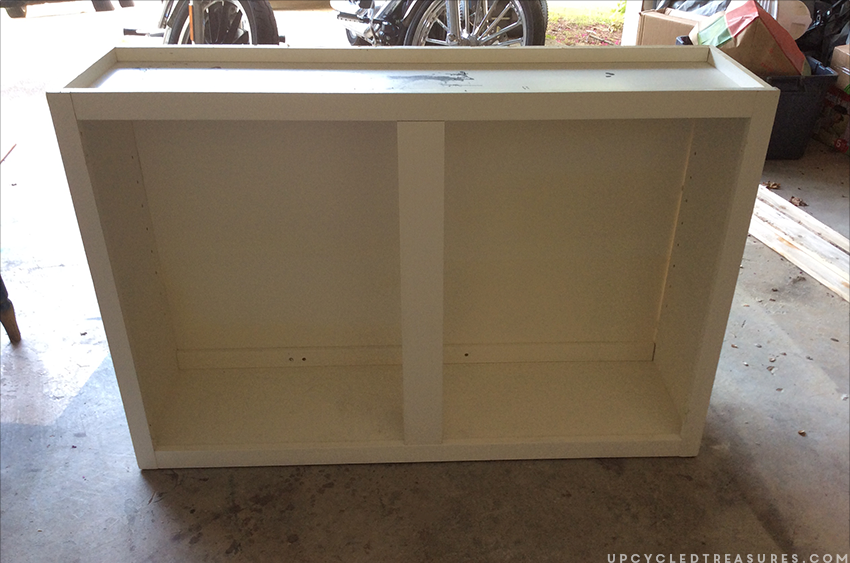 How to upcycle trash into treasure! See how a thrown out cabinet is transformed into an upcycled barnwood style sideboard. MountainModernLife.com