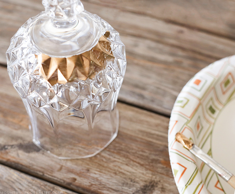 See how easy it is to create these DIY gilded glasses using stemware you may already have on hand and some liquid leaf! MountainModernLife.com