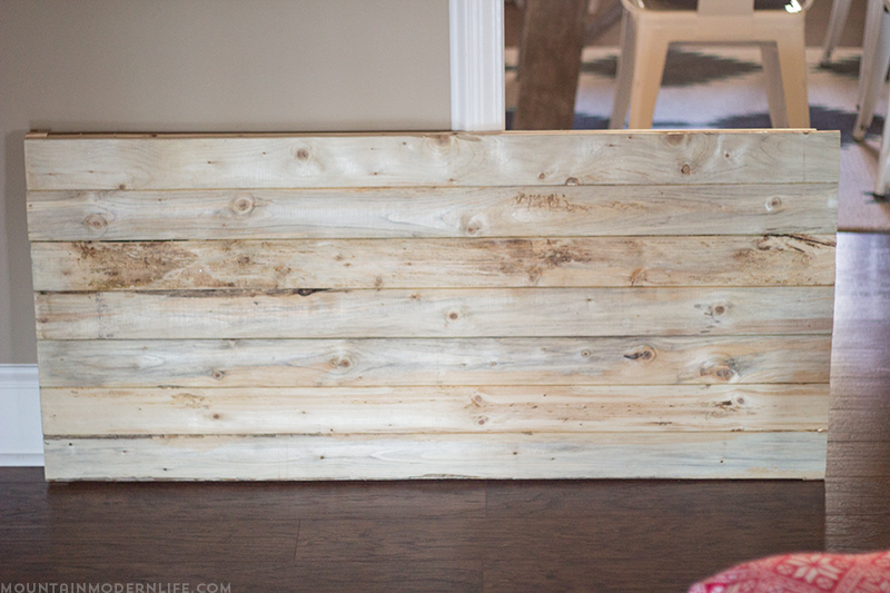 large-handmade-christmas-sign-on-planked-wood-before-mountainmodernlife.com