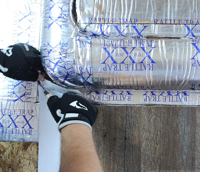 using cardboard template to install lvp flooring in RV