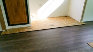 adding-underlayment-to-rv-slide-for-new-flooring-mountainmodernlife.com