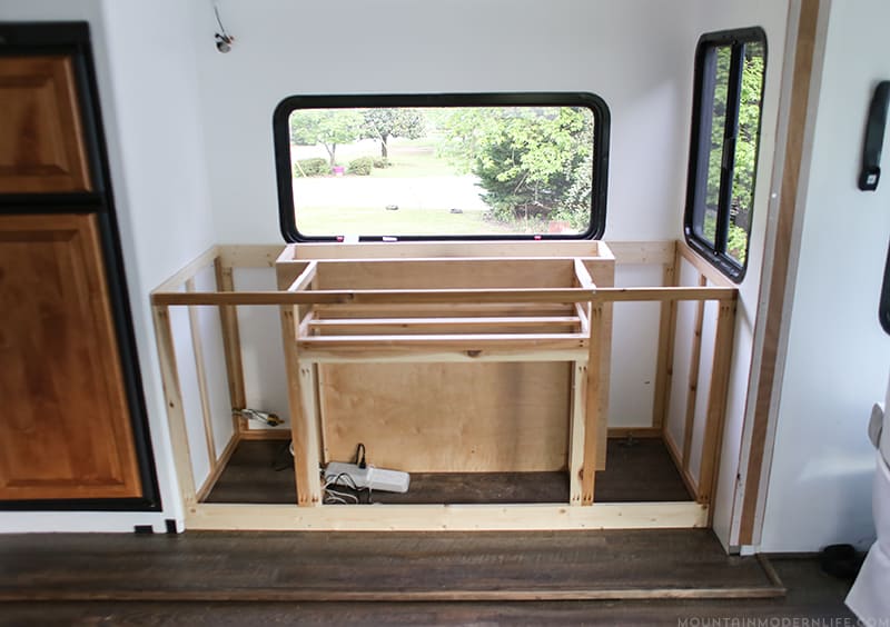 custom-built-in-rv-media-cabinet-with-tv-lift-progress-mountainmodernlife.com