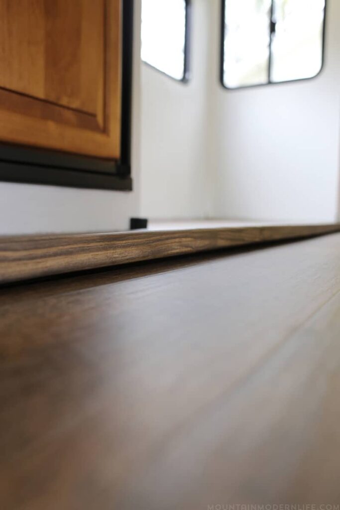 update RV slide out flooring