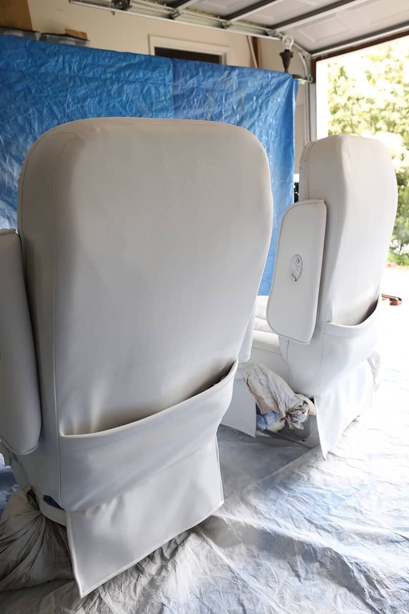 Thinking about painting vinyl or simulated leather furniture? Before you do be sure to check out this post with tips for painting an upholstered chair with a paint sprayer and see if painting our RV captain's chairs was worth it | MountainModernLife.com