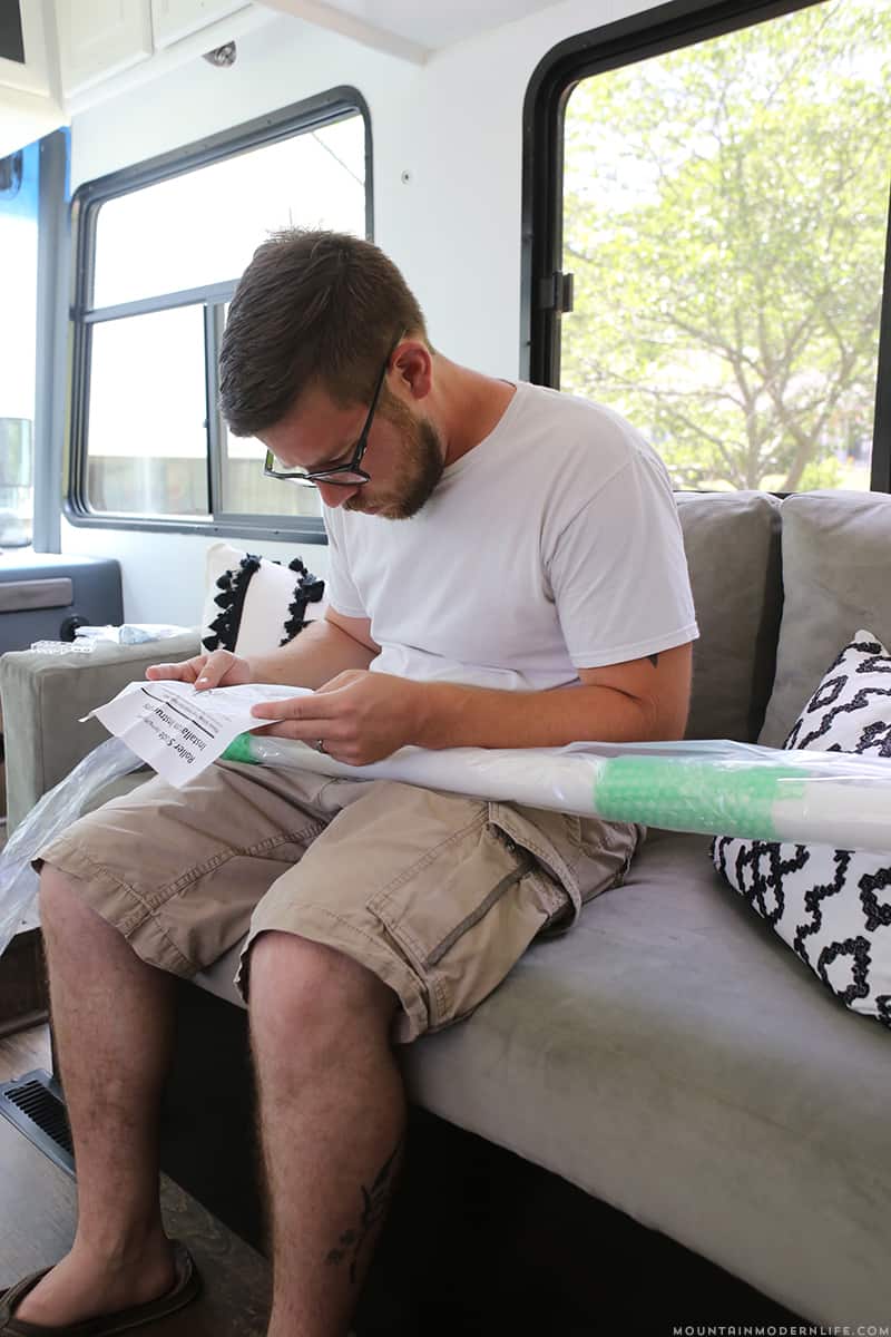 Looking to replace those bulky curtains in the front of your RV? See how easy it was for us to install our new RV windshield roller shades! MountainModernLife.com